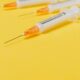 Syringes on a yellow background